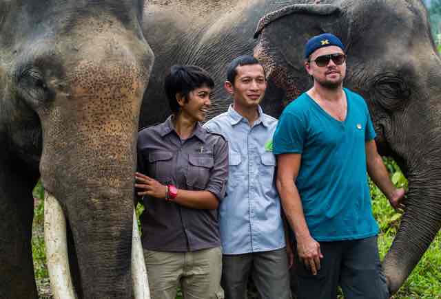Wildlife Conservationists Farwiza Farhan with Leonardo DiCaprio for Wild Lives book